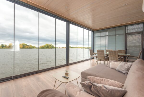 Photo by Max Vakhtbovych: https://www.pexels.com/photo/interior-of-contemporary-house-on-lake-on-cloudy-day-6527069/